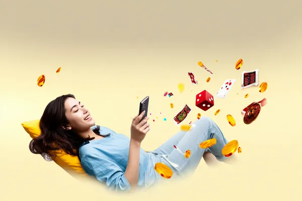 A woman smiling by bright slot machines showing lucky symbols, showcasing the exciting slot offerings at MOSTBED.
